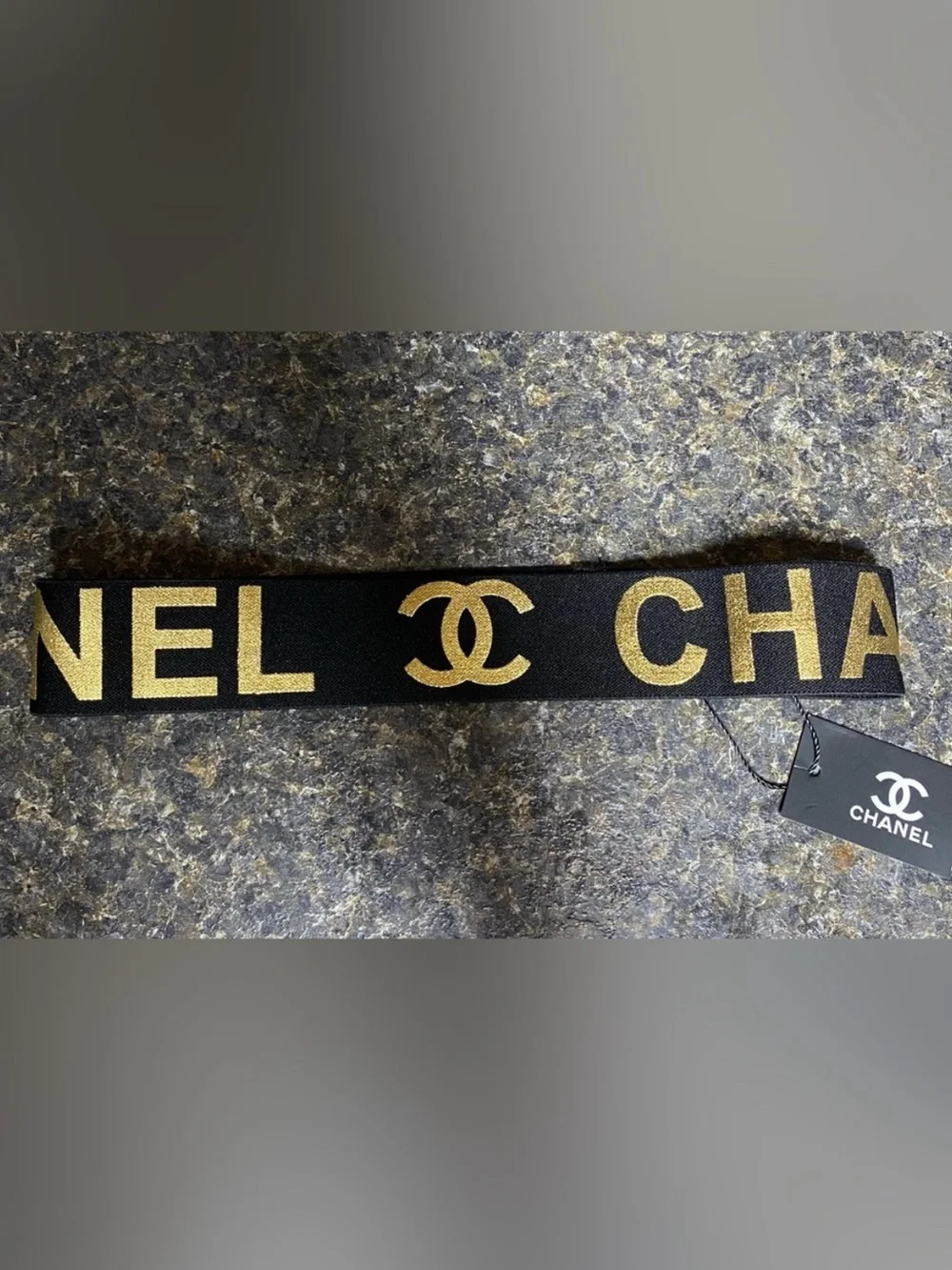 ChaneI Black Metallic Gold Stretch Spellout Headband
